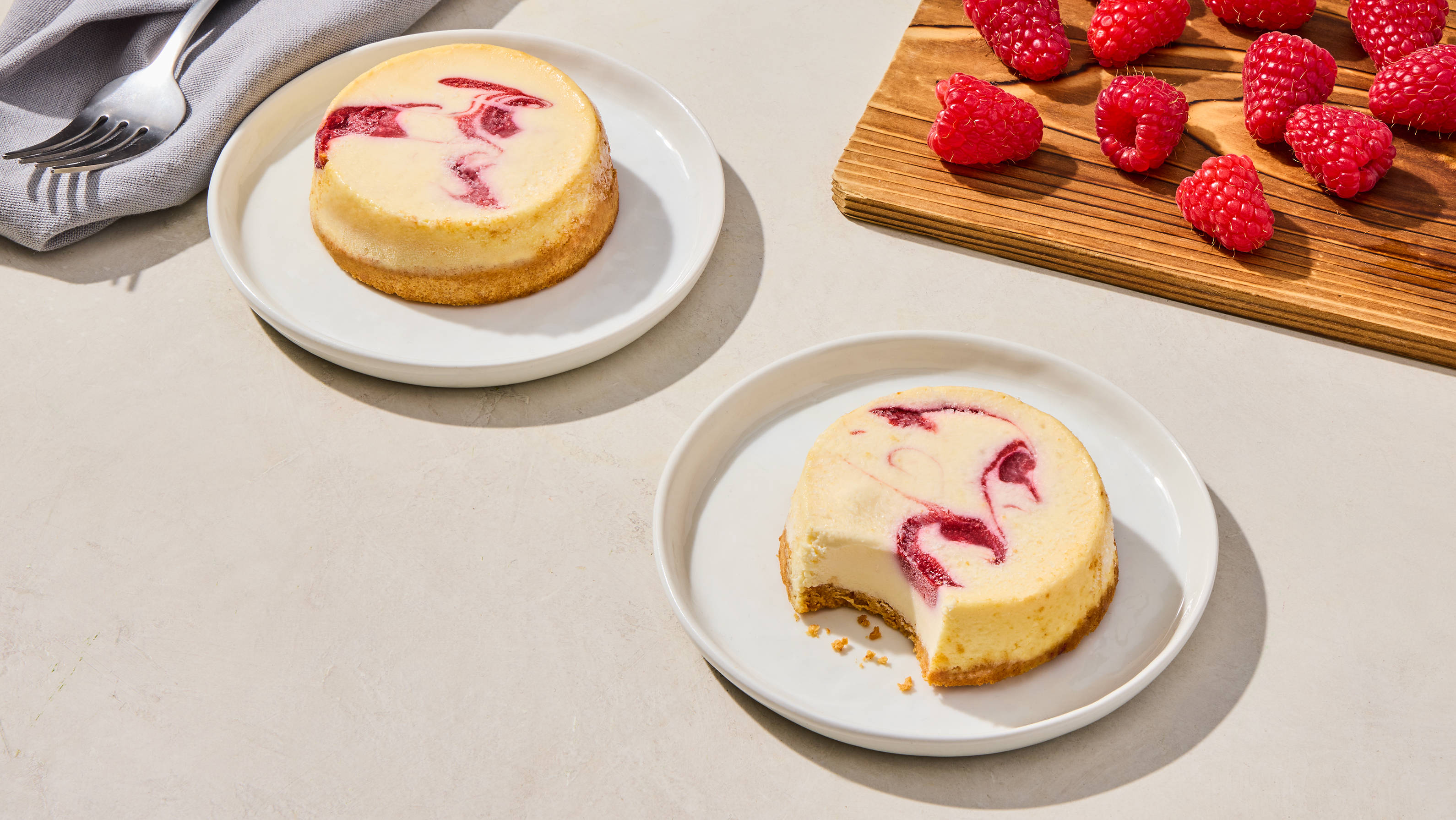 Vanilla Raspberry Cheesecakes