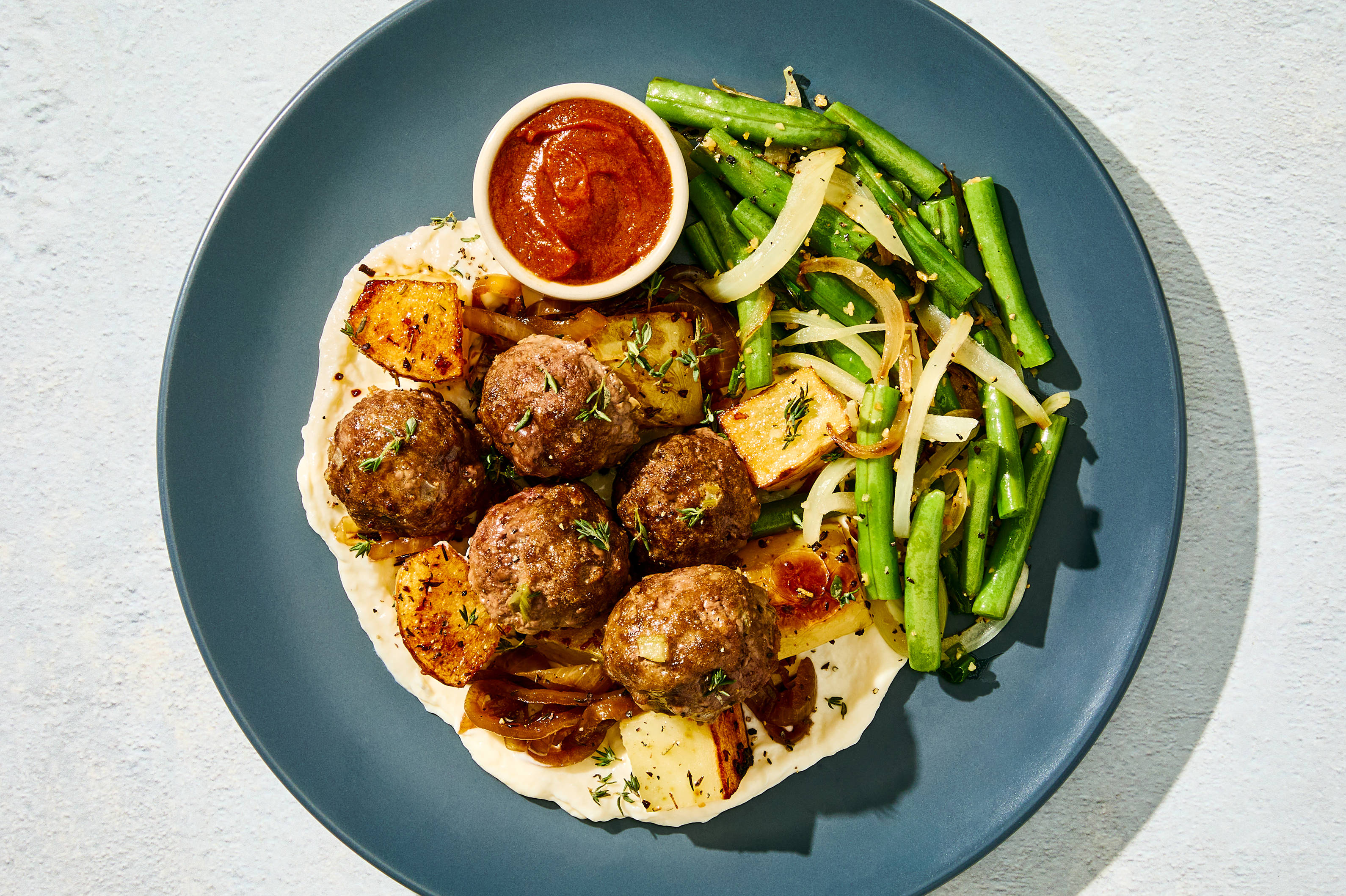 Currywurst Meatballs & Swiss Fondue Potatoes