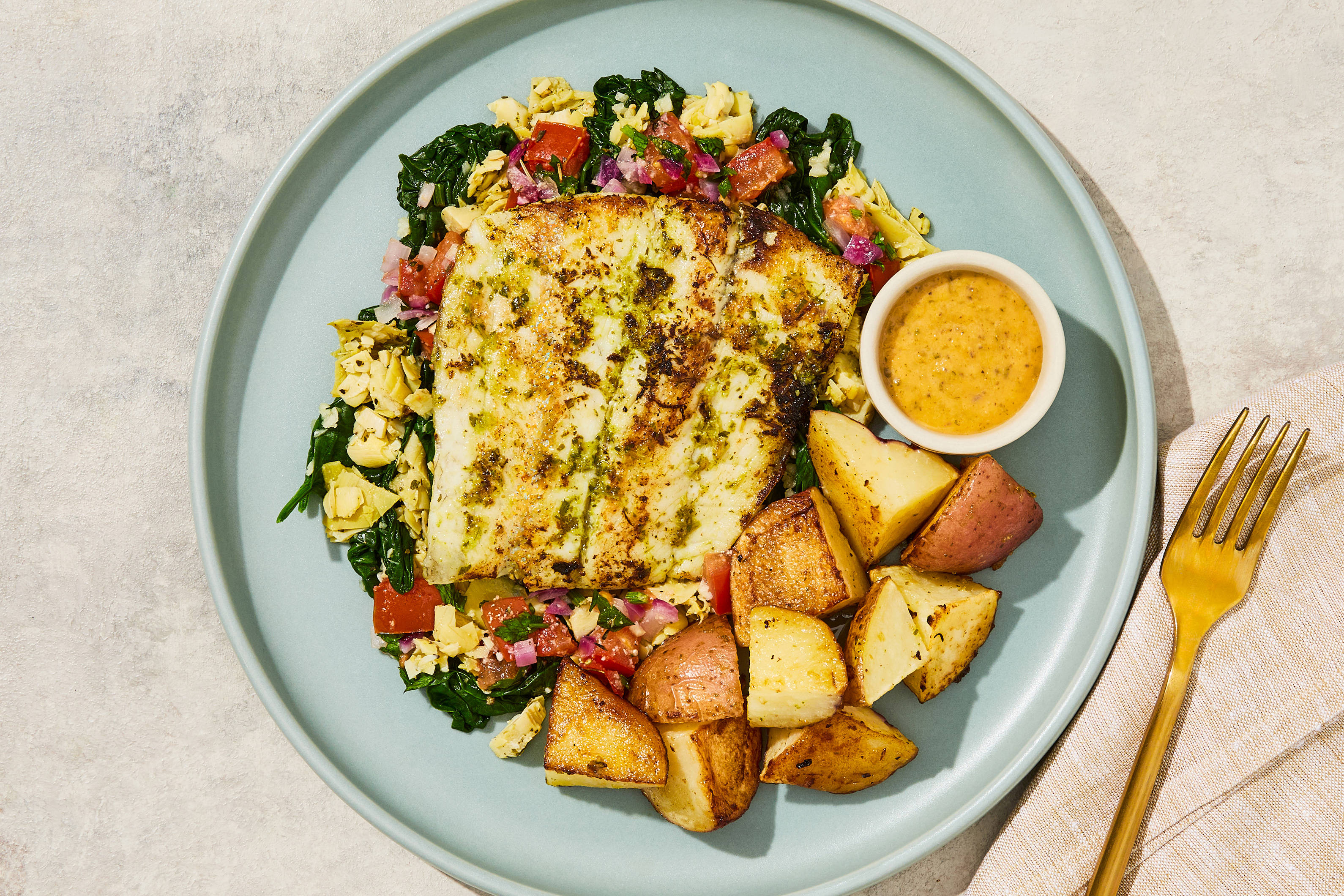 Spinach-Artichoke-Tomato Barramundi