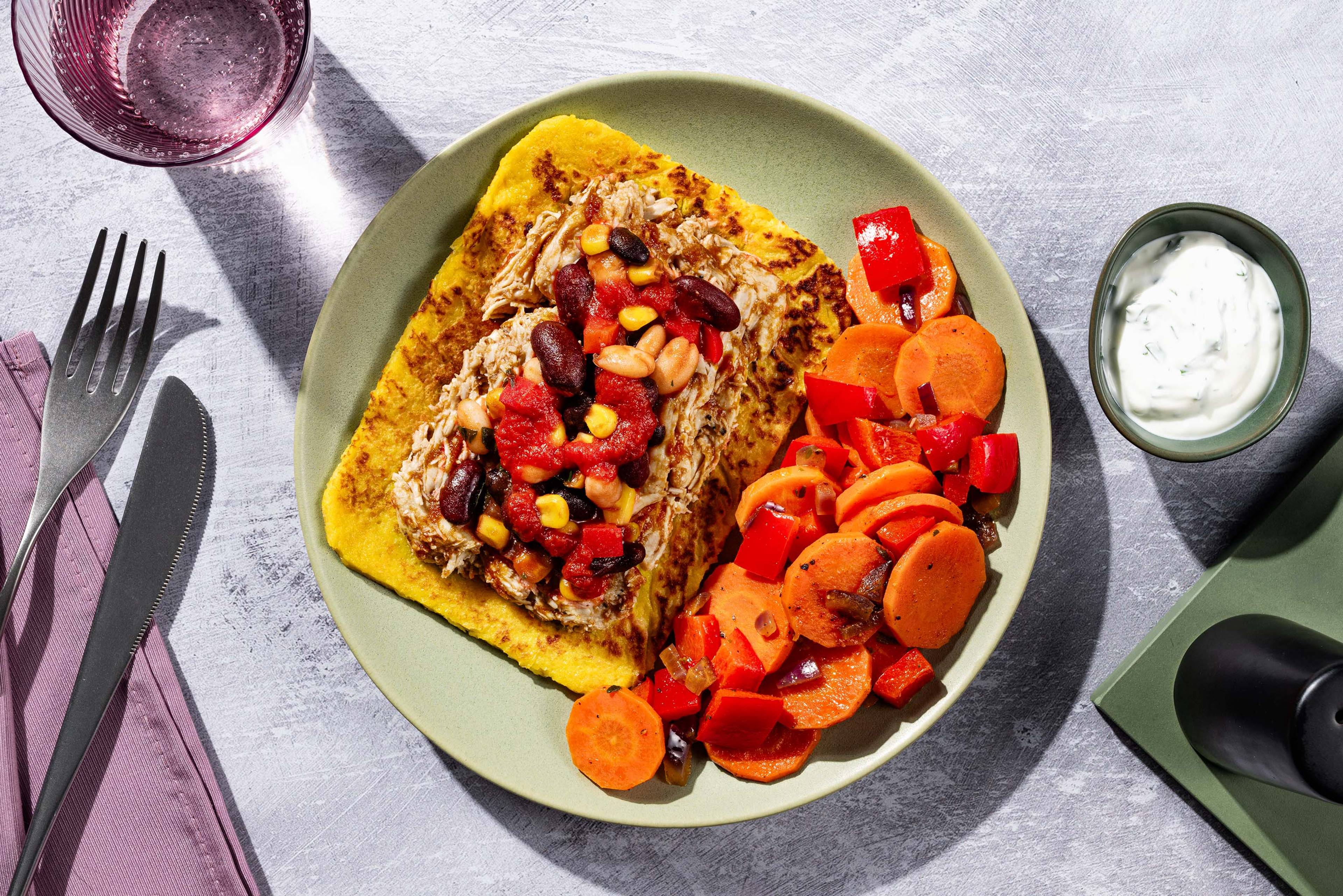 Pittige pulled chicken en bonen